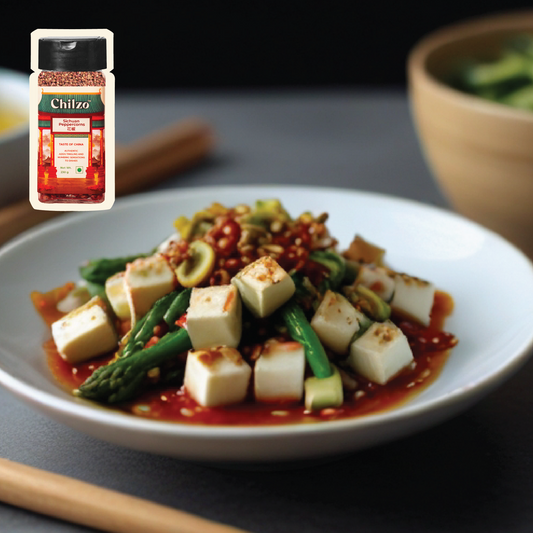 Spicy asparaghus served in a bowl. Sichuan style asparaghus recipe made with Chilzo's Sichuan peppercorns. 