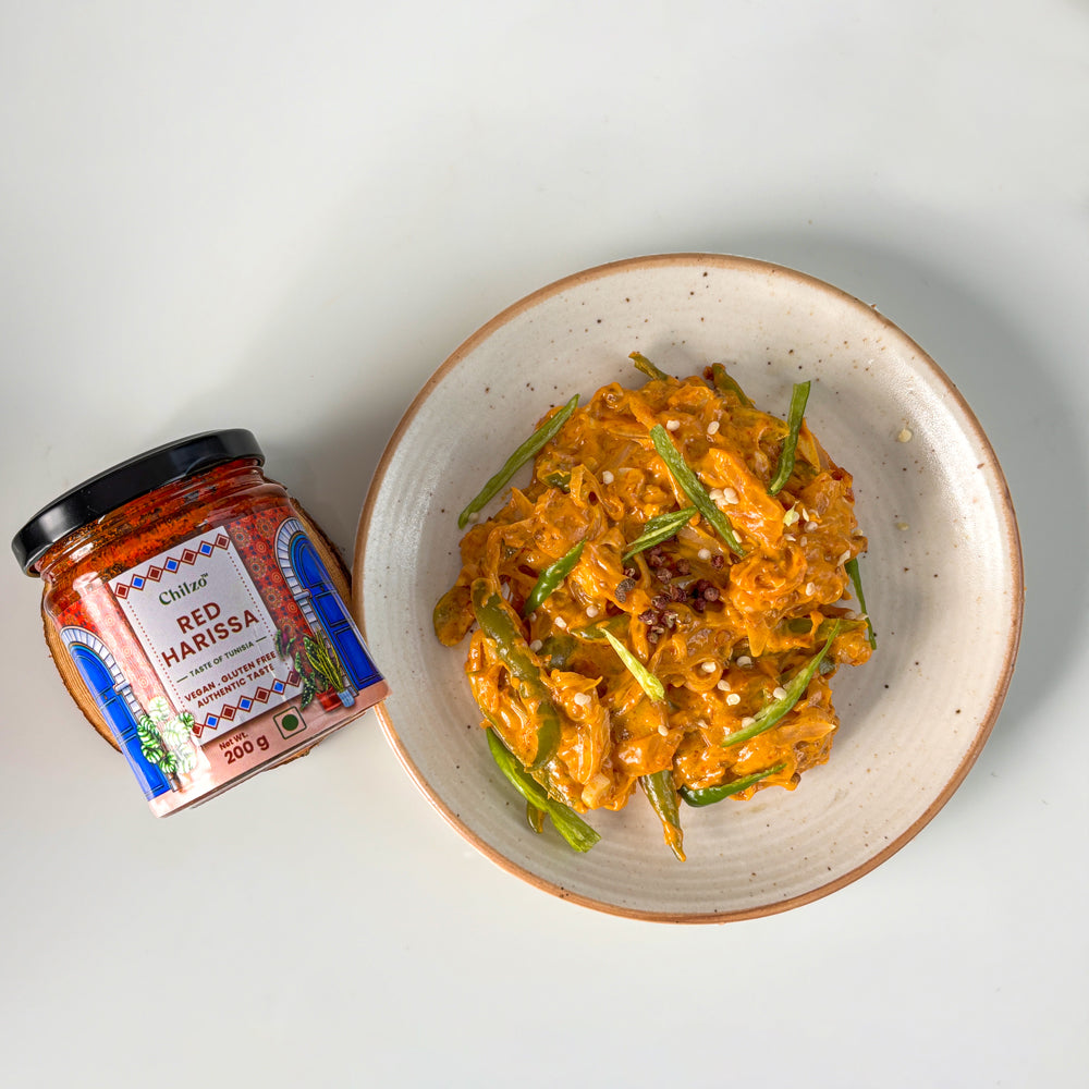 Cheesy & creamy Bhutanese Ema Datshi recipe with green & red chillies & Chilzo's Hot Sauce.