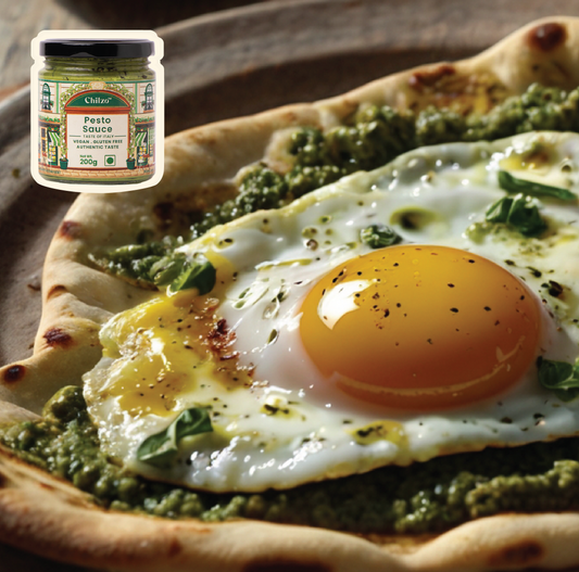 Delicious flatbread topped with Chilzo's green pesto and perfectly fried eggs, sprinkled with gooey mozzarella cheese and garnished with fresh basil. 