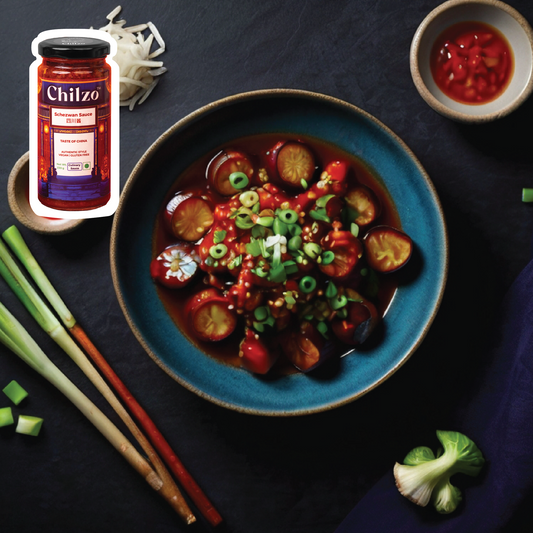 Bowl of tasty Spicy Sichuan eggplant: Stir-fried with garlic, ginger, and Chilzo's Schezwan sauce. 
